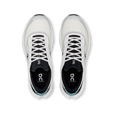A pair of On Cloudcotta running shoes shown from a top-down view, featuring a white and black design with a subtle light blue accent near the heel. - On Cloudvista 3 Shoes (Men's) - Ivory/Wash