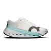 A white On running shoe with a light blue midsole accent and a dark gray textured circular logo on the side, shown against a plain white background. - On Cloudultra Pro Shoes (Women's) - Ivory/Celeste