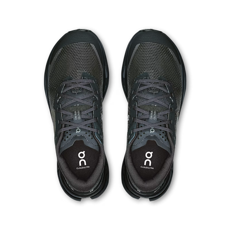 Pair of black running shoes with 'On' branding on a white background - Black/Black