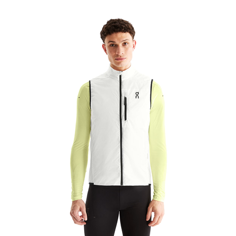 Person wearing a white and green cycling jacket on a white background - On Weather Vest (Men's) - White/Black