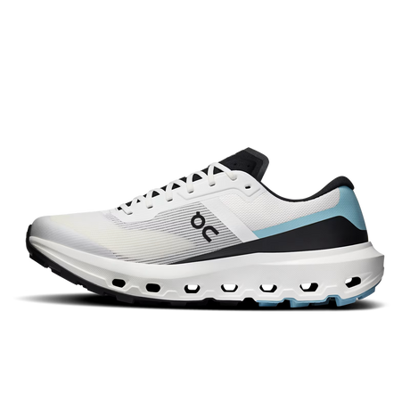 A white On running shoe with black and light blue accents, shown in a side profile on a white background. - On Cloudvista 3 Shoes (Men's) - Ivory/Wash