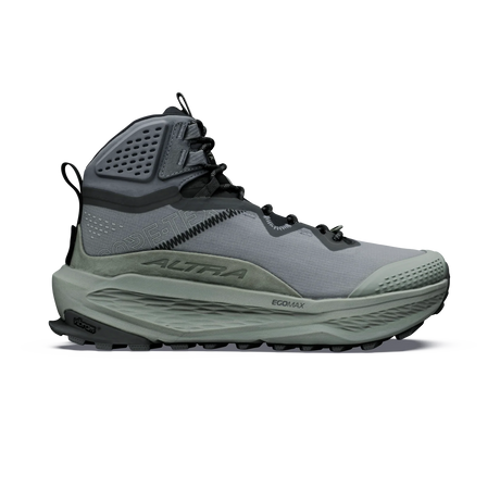 A single high-top outdoor boot shown in profile against a solid white background. The boot features a gray mesh upper, a dark gray ankle collar with a textured panel, a thick gray midsole, and a rugged gray and black outsole. - Altra Olympus 7 Hike Mid GORE-TEX Boots (Women's) - Castlerock