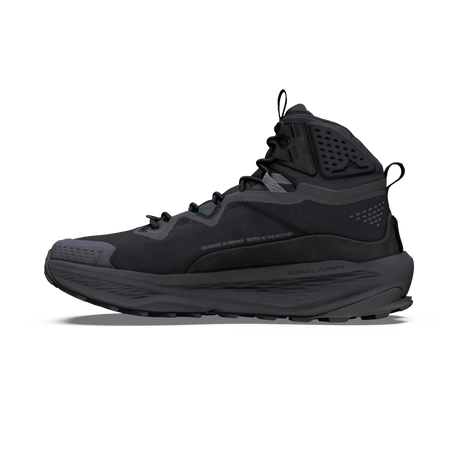 A single high-top outdoor boot in all-black and dark gray, shown in a side profile on a clean white background. - Altra Olympus 7 Hike Mid GORE-TEX Boots (Men's) - Black/Shadow