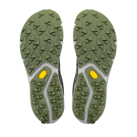 Top-down view of a pair of athletic shoes showing their green treaded soles with gray sculpted channels and small yellow accents, set against a plain white background. - Altra Experience Wild 3+ Shoes (Men's) - Chocolate/Torte