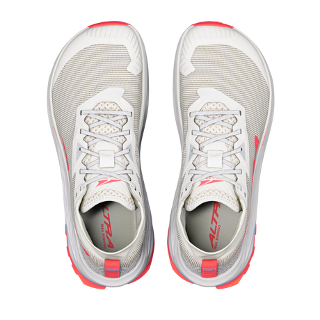A pair of Hoka running shoes shown from a top-down view, featuring a light gray and white mesh upper with bright coral pink accents on the outsole, heel pull tabs, and inner lining. - Altra Olympus 275 HiLo Shoes (Women's) - Grey/Coral