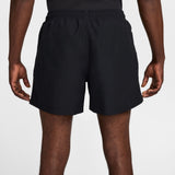 Rear view of a person wearing black athletic shorts against a light gray studio background. - Nike ACG Reservoir Goat Shorts (Men's) - Black/Anthracite/Summit White