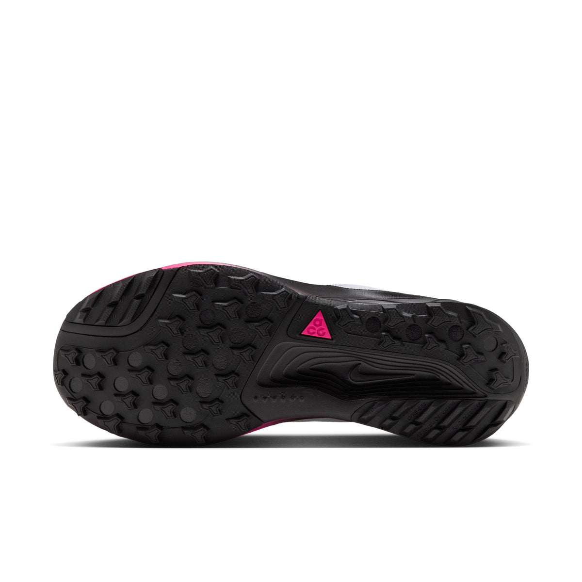 The black outsole of a trail running shoe, featuring a textured tread pattern and a small bright pink logo accent, shown against a white background. - Nike ACG Pegasus Trail Shoes (Men's) - Pure Platinum/Black-Hyper Pink
