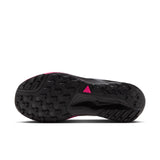 The black outsole of a trail running shoe, featuring a textured tread pattern and a small bright pink logo accent, shown against a white background. - Nike ACG Pegasus Trail Shoes (Men's) - Pure Platinum/Black-Hyper Pink