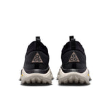 A pair of black and dark gray trail running shoes shown from the rear, featuring a black mesh upper, a gray triangular ACG logo on the heel, and a chunky off-white sole with 'ZOOMX' branding. - Nike ACG Zegama Hike Shoes (Men's) - Black/Ironstone-Cream II