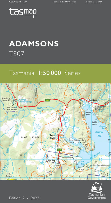 Front cover of the TASMAP Adamsons TS07 map edition 2, 2023, featuring a dark gray header with the tasmap logo and product name, a light green band, and a detailed topographical map of Tasmania. - Tasmap 1:50000 Topographic/Cadastral Maps - Adamsons
