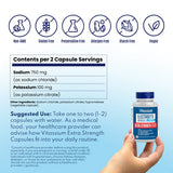A hand holds a bottle of Vitassium Extra Strength Electrolyte capsules against a light blue background with informational text and icons about dietary benefits like Non-GMO, Gluten Free, Preservative Free, Allergen Free, Starch Free, and Vegan. - SaltStick Vitassium Extra Strength Capsules