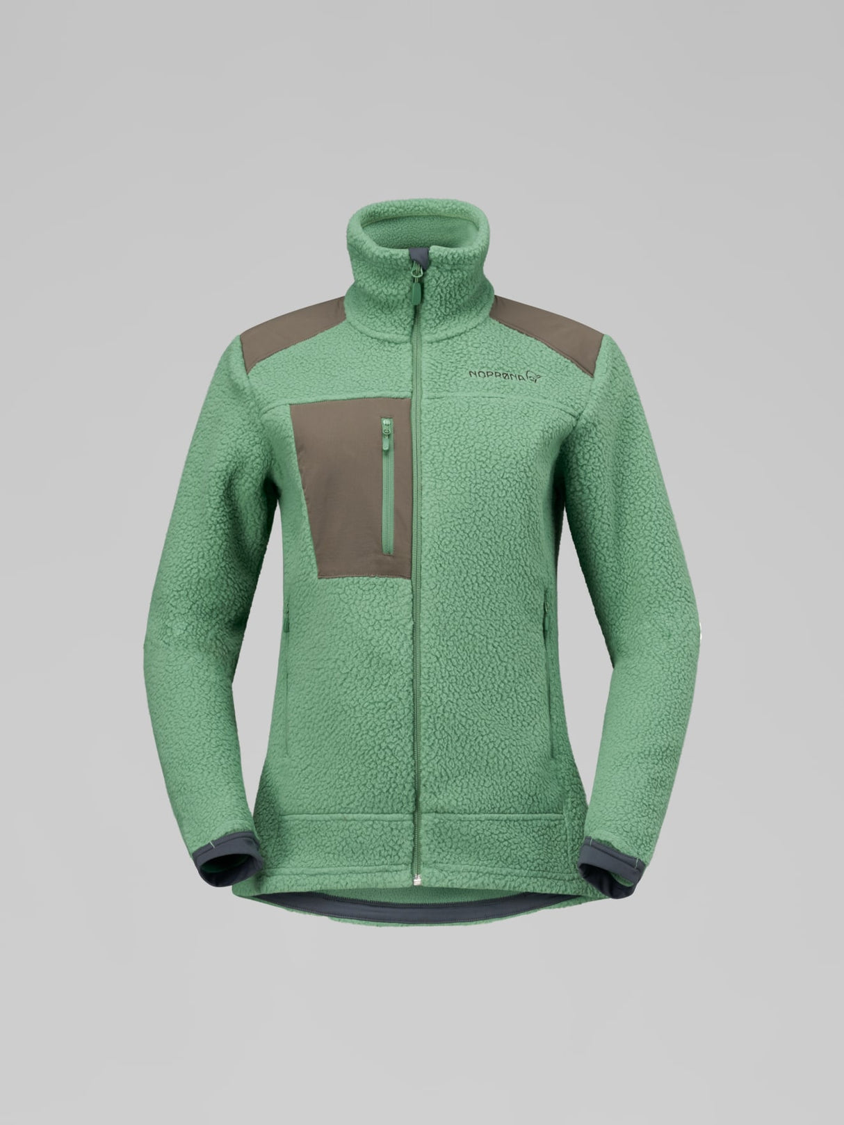 A green fleece jacket with brown shoulder panels and a matching brown chest pocket, shown on a neutral gray background. - Norrøna Trollveggen Warm3 Jacket (Women's) - Dark Ivy