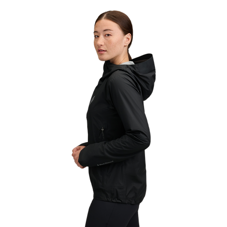 women wearing Black black diamond deploy 3l shell rain jacket with a brand logo on a white background