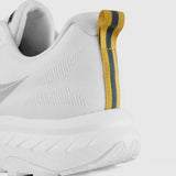 White athletic shoe with a yellow and gray accent on a white background - Tarkine Bandicoot Shoes (Women's) - Whiteout