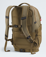 A tan The North Face Fly Vent backpack shown from the rear three-quarter view, featuring padded shoulder straps, compression buckles, and side mesh pockets against a light gray background. - The North Face Borealis Backpack - Cedar/Lava Red