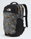The North Face Paralyne backpack in black and gray with a white map print and bright orange compression straps, shown on a light gray background. - The North Face Borealis Backpack - Anthracite Grey Conrad Topos Print/Summit Gold