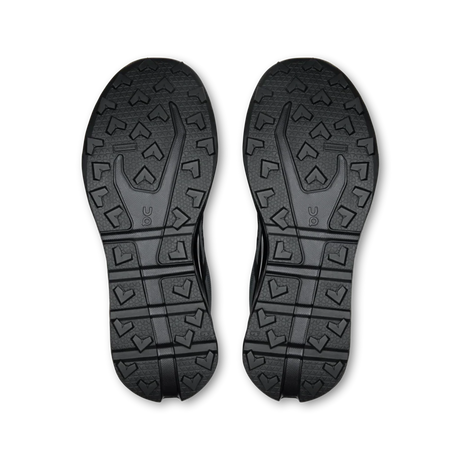 A pair of black athletic shoes shown from the sole view, displaying their textured tread patterns against a plain white background. - On Cloudvista 3 Waterproof Shoes (Men's) - Black
