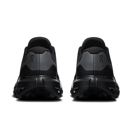 A pair of black and dark gray trail running shoes shown from the rear, featuring the 'on' logo on the heel, set against a plain white background. - On Cloudvista 3 Waterproof Shoes (Men's) - Black
