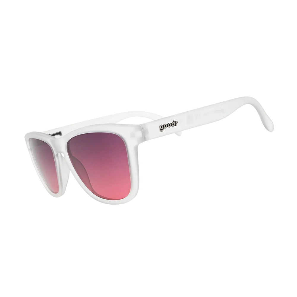 White sunglasses with a thick square frame and pink-to-purple gradient lenses, featuring the 'speedy' brand logo on the temple arm. - Goodr The OG's Sunglasses - Emergency Flirtation Device