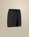 Black athletic shorts with an elastic drawstring waistband and a small white Arc'teryx logo on the lower left hem, shown against a solid beige background. - Arc'teryx Norvan Liner Shorts 7" (Men's) - Black