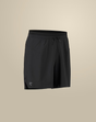 Black athletic shorts with an elastic drawstring waistband and a small white Arc'teryx logo on the lower left hem, shown against a solid beige background. - Arc'teryx Norvan Liner Shorts 7" (Men's) - Black