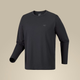 A dark charcoal gray long-sleeve crewneck shirt with a small tonal Arc'teryx logo on the left chest, displayed on a neutral beige background. - Arc'teryx Cormac Crew Neck Shirt Long Sleeve (Men's) - Black