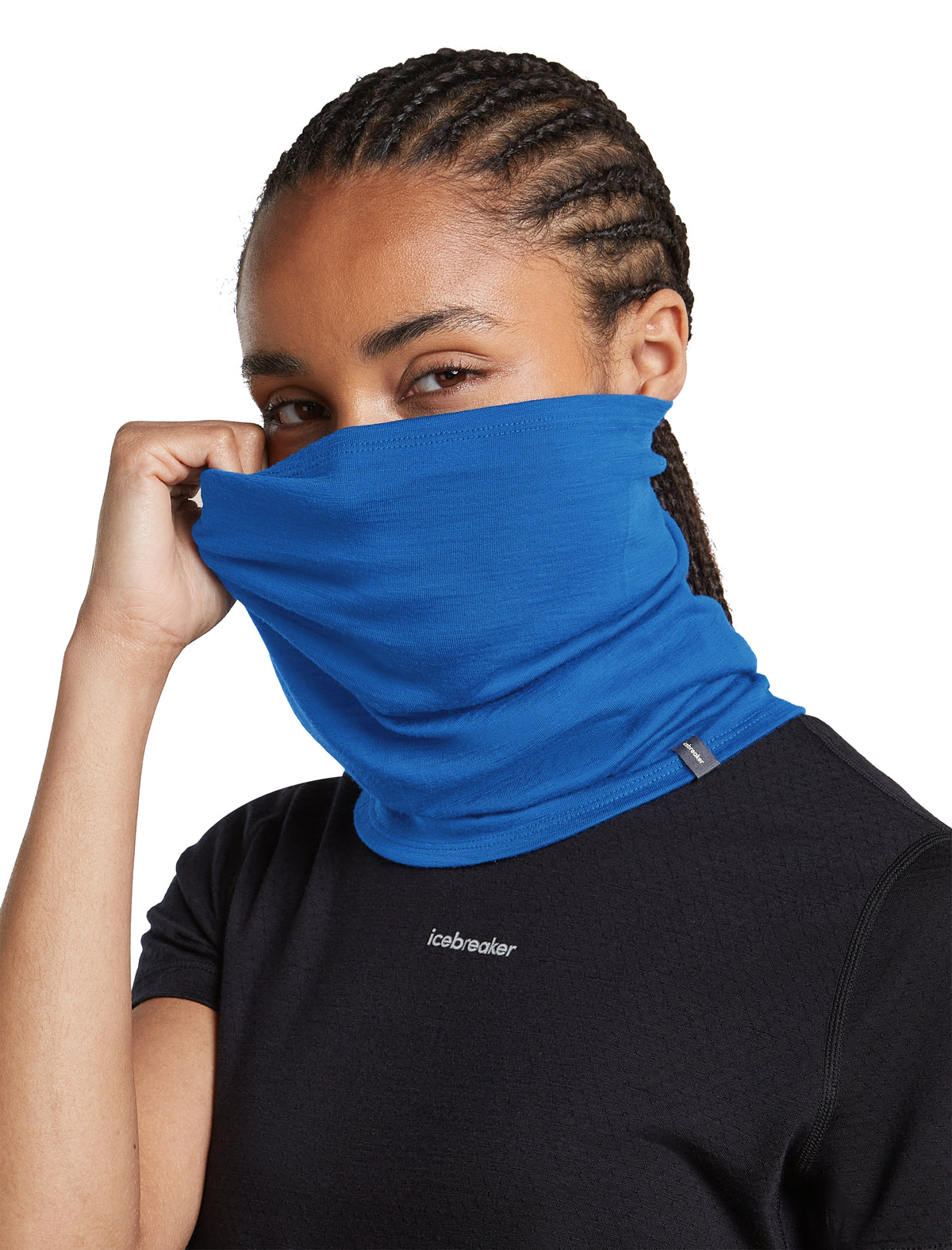 A woman wearing a bright blue neck gaiter pulled up over her nose and mouth, paired with a black athletic t-shirt against a solid white background. - Icebreaker Merino 200 Flexi Chute (Unisex) - Lazurite