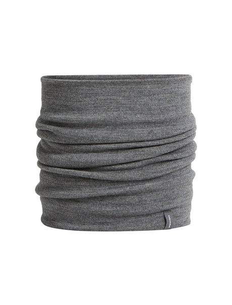 A heather gray knit neck gaiter or balaclava shown folded to display its soft texture and pliable shape, set against a plain white background. - Icebreaker Merino 260 Apex Chute (Unisex) - Gritstone Heather