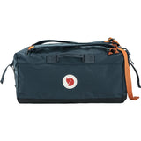 Blue duffel bag with orange straps and a visible brand logo on a white background - Fjällräven Färden Duffel 50 - Navy