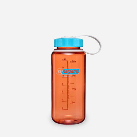 An amber translucent plastic water bottle with a bright blue cap and a white carrying loop, featuring red measurement markings and a blue Halgene logo on the front, set against a light gray background. - Nalgene Wide Mouth Sustain Water Bottle (500ml) - Flame With Blue Atoll
