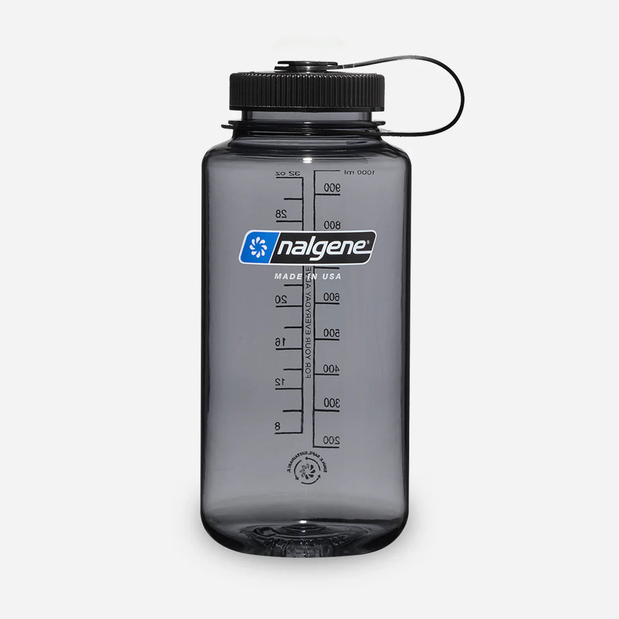 A translucent gray Nalgene water bottle with a black screw cap and carrying loop, shown on a light gray background. The front features the blue and white Nalgene logo and black measurement markings. - Nalgene Wide Mouth Sustain Water Bottle (1L) - Grey/Black
