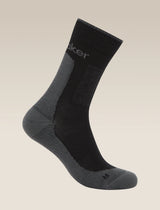 Black and gray sock on a beige background - Icebreaker Merino Hike+ Medium Crew Socks (Men's) - Black/Obsidian