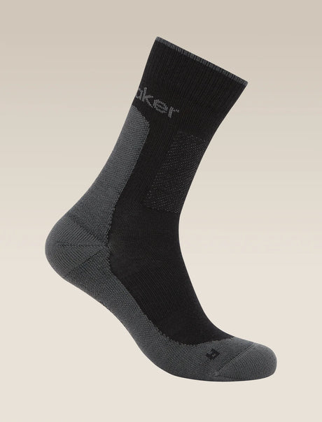 Black and gray sock on a beige background - Icebreaker Merino Hike+ Medium Crew Socks (Men's) - Black/Obsidian