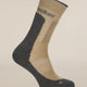 A single mid-calf athletic sock shown on a ghost mannequin against a solid light beige background. The sock features a beige knit body with a dark gray heel, toe, and ribbed cuff, and has the brand name 'saker' printed in dark gray on the upper calf. - Icebreaker Merino Hike+ Medium Crew Socks (Men's) - Cumin/Obsidian