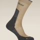 A single mid-calf athletic sock shown on a clean, light beige background. The sock features a beige upper section and a dark gray lower section with a textured knit pattern. - Icebreaker Merino Hike+ Light Crew Socks (Men's) - Cumin/Obsidian