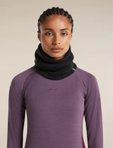 A model wearing a dark charcoal gray neck warmer over a purple long-sleeve athletic top, photographed against a solid light beige background. - Icebreaker Merino Blend 800 RealFleece Classic Pile Chute (Unisex) - Black
