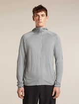 Man wearing a gray jacket on a beige background - Icebreaker 150 MerinoFine Ace Long Sleeve Zip Hoodie (Men's) - Proto Grey