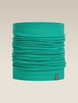 A teal green tubular neck gaiter or face mask, folded to show its layered fabric texture, with a small dark brand tag on the bottom right, set against a solid beige background. - Icebreaker Merino 200 Flexi Chute (Unisex) - Fresh