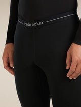 Black leggings with Icebreaker logo on a beige background - Icebreaker Merino 200 Oasis Thermal Leggings (Men's) - Black