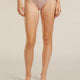 Person wearing a light pink high-waisted bikini bottom on a beige background - Icebreaker Merino 150 Siren Hipkini (Women's) - Pink Quartz