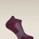 A single low-cut ankle sock in a deep plum purple color, featuring a textured knit pattern and a breathable mesh panel on the side, shown against a solid light beige background. - Icebreaker Merino Multisport Light Micro Socks (Women's) - Dark Berry/Midnight Navy/Grey Plum
