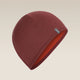 A dark red knit beanie hat with a small gray brand tag on the side, displayed against a light beige gradient background. - Icebreaker Merino 200 Pocket Hat (Unisex) - Agate/Port