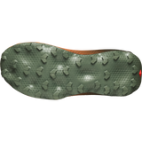 The outsole of a trail running shoe, featuring a dark olive green tread with hexagonal and pentagonal lugs, shown against a plain white background. - Salomon Ultra Glide 4 Shoes (Men's) - Urban Chic/Black/Lime Cream