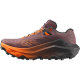 A trail running shoe in a dark plum-brown mesh upper with bright orange accents, a thick black and orange midsole, and a rugged black outsole, shown from a side profile on a white background. - Salomon Ultra Glide 4 Shoes (Women's) - Huckleberry/Black/Red Orange
