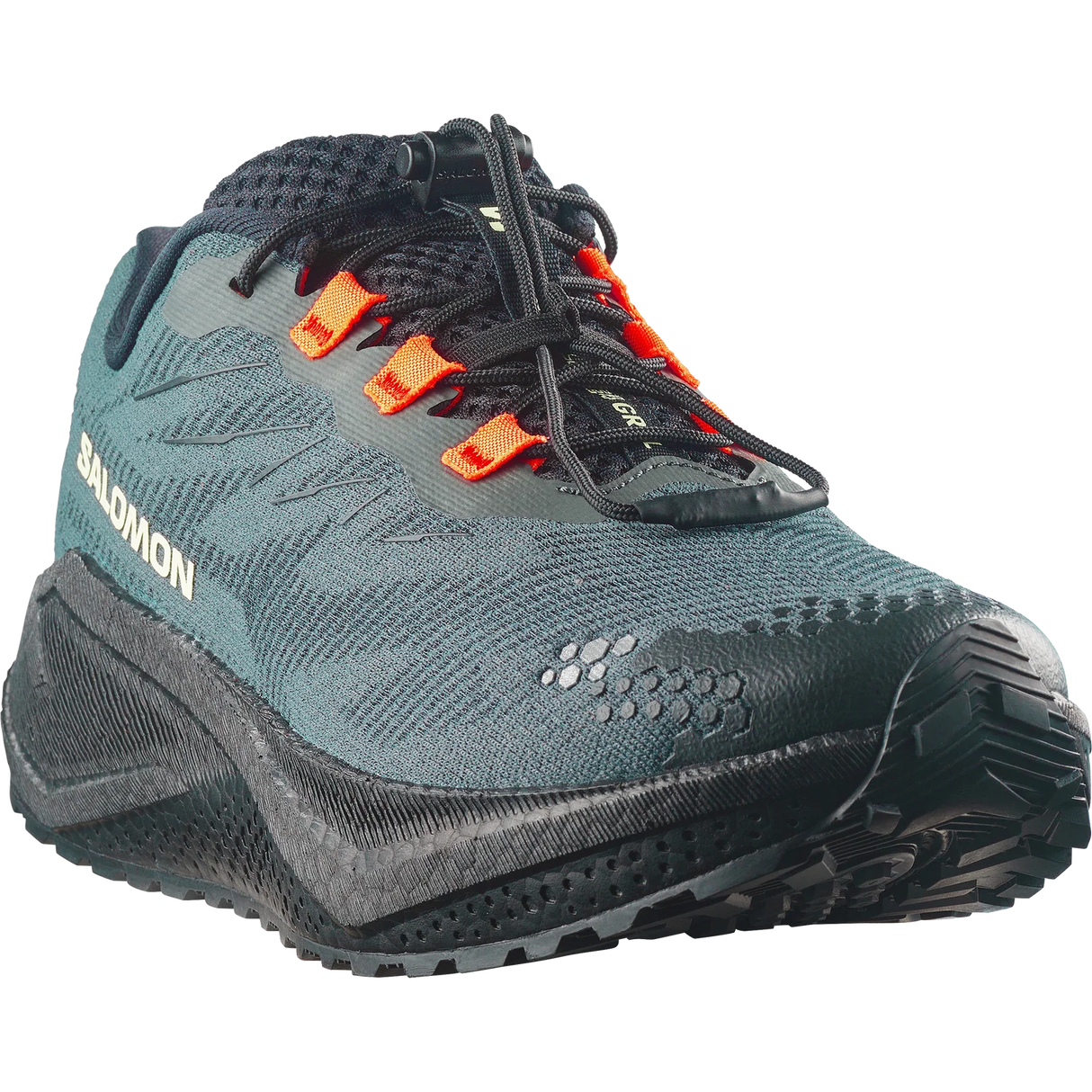 Salomon trail running shoe in dark teal and black with bright orange laces, shown from a three-quarters angle on a white background.- Salomon Aero Blaze 4 GRVL Shoes (Men's) - Urban Chic/Black/Lime Cream