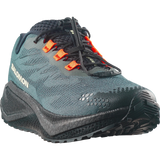 Salomon trail running shoe in dark teal and black with bright orange laces, shown from a three-quarters angle on a white background.- Salomon Aero Blaze 4 GRVL Shoes (Men's) - Urban Chic/Black/Lime Cream