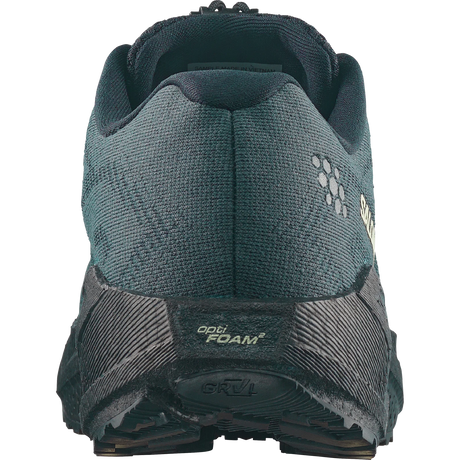 Close-up rear view of a trail running shoe in dark teal and black, showing the textured mesh upper, heel counter, and sole with 'opti FOAM' and 'GRAIL' branding.- Salomon Aero Blaze 4 GRVL Shoes (Men's) - Urban Chic/Black/Lime Cream