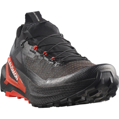 Salomon Salbris X Ultra trail running shoe in black and dark gray with bright orange-red accents on the side and heel, shown from a three-quarters angle on a white background. - Salomon S/LAB Genesis 2 Shoes (Unisex) - Black/Black/Fiery Red