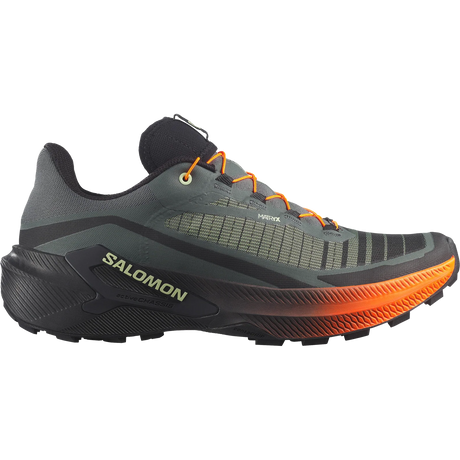 Salomon trail running shoe in dark gray and black with bright orange laces and a vibrant orange outsole, shown from a side profile on a white background. - Salomon Genesis 2 Shoes (Men's) - Urban Chic/Black/Lime Cream