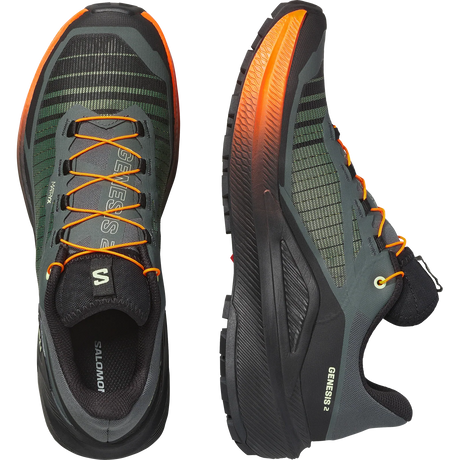 Salomon Genesis 2 running shoes shown from the top and side views on a white background. The shoes feature a dark gray and black mesh upper with vibrant orange accents on the laces, outsole, and heel. - Salomon Genesis 2 Shoes (Men's) - Urban Chic/Black/Lime Cream